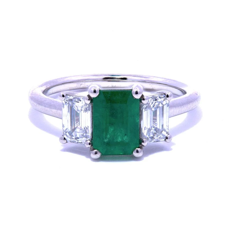 Halo - Style Diamond Rings with Smaller Accent DiamondsPlatinum 0.95ct Emerald Cut Emerald And 0.60ct Emerald Cut Diamond Three Stone Ring