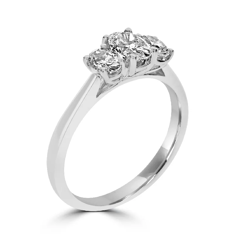 Solitaire Diamond Rings in Platinum SettingsPlatinum 0.59ct Oval Cut Diamond Three Stone Engagement Ring