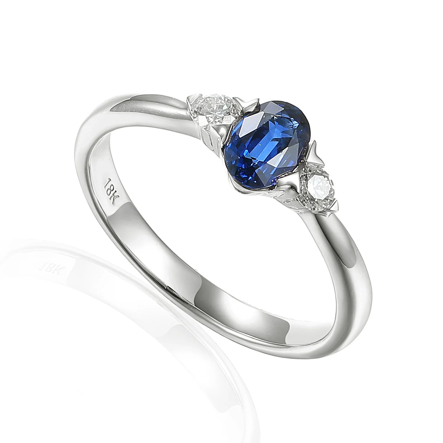 Custom - Designed Diamond Rings to Reflect Your Personality18ct White Gold 0.73ct Oval Cut Blue Sapphire And 0.13ct Round Brilliant Cut Diamond Three Stone Ring