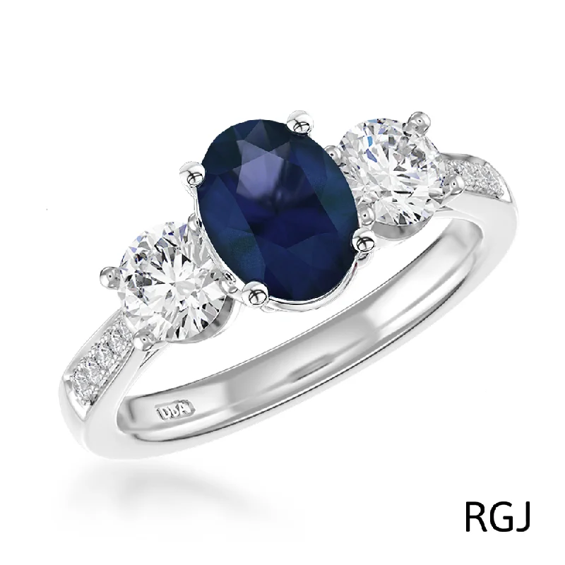 Halo - Style Diamond Rings with Smaller Accent DiamondsThe Memoire Platinum 0.98ct Oval Cut Blue Sapphire And 0.55ct Diamond Three Stone Engagement Ring With Diamond Set Shoulders