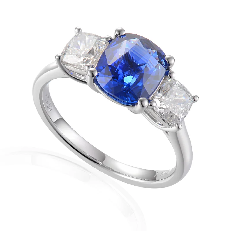 Halo - Style Diamond Rings with Smaller Accent DiamondsPlatinum Cushion Cut 2.28ct Blue Sapphire And 1.02ct Diamond Three Stone Ring