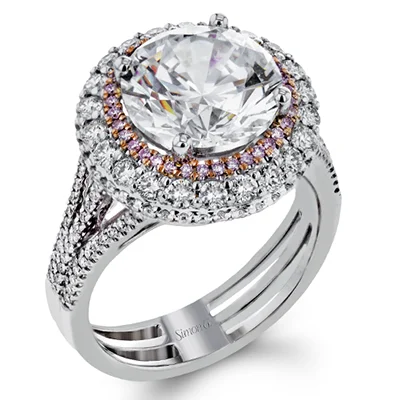 Solitaire Diamond Rings in Platinum SettingsEngagement Ring in 18k Gold with Diamonds