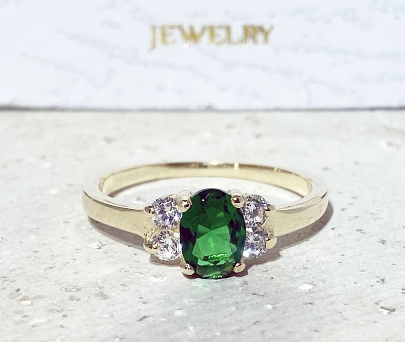 Sapphire Gemstone Rings in a Cathedral SettingEmerald Ring - May Birthstone - Delicate Ring with Oval Emerald Gemstone and Clear Quartz Accents