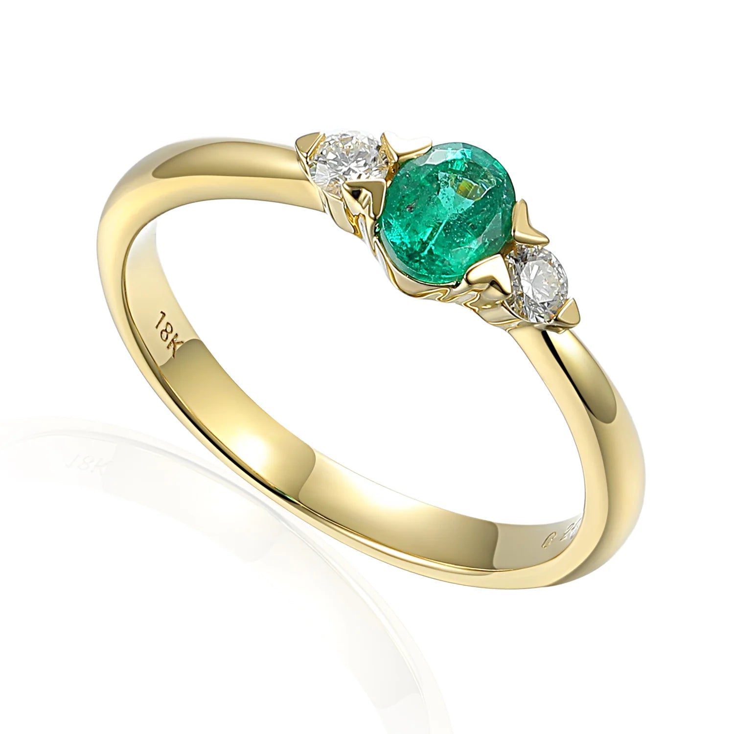 Solitaire Diamond Rings in Platinum Settings18ct Yellow Gold 0.44ct Oval Cut Emerald And 0.13ct Round Brilliant Cut Diamond Three Stone Ring