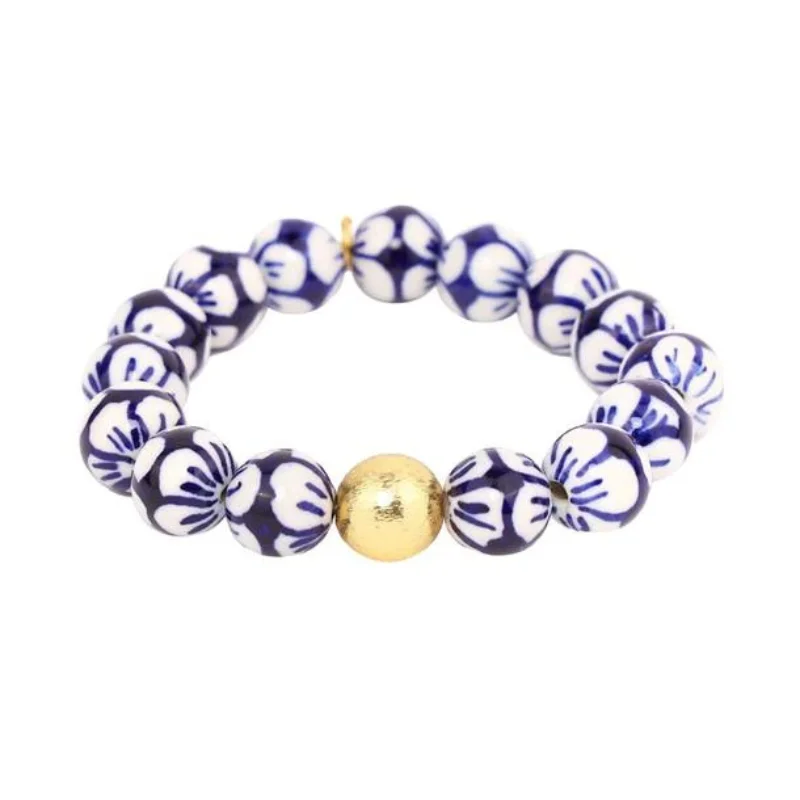 Solid Gold Bangles with Intricate EngravingsBuDhaGirl | Porcelain Beaded Lotus Bracelet