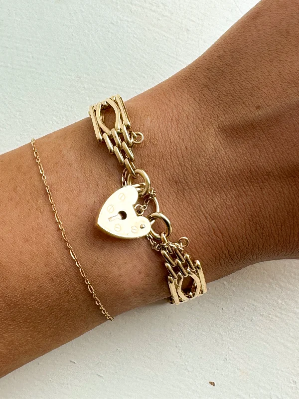 Enamel - Coated Bangles in Vibrant ColorsVintage 9ct Yellow Gold Gate Bracelet With Heart Lock