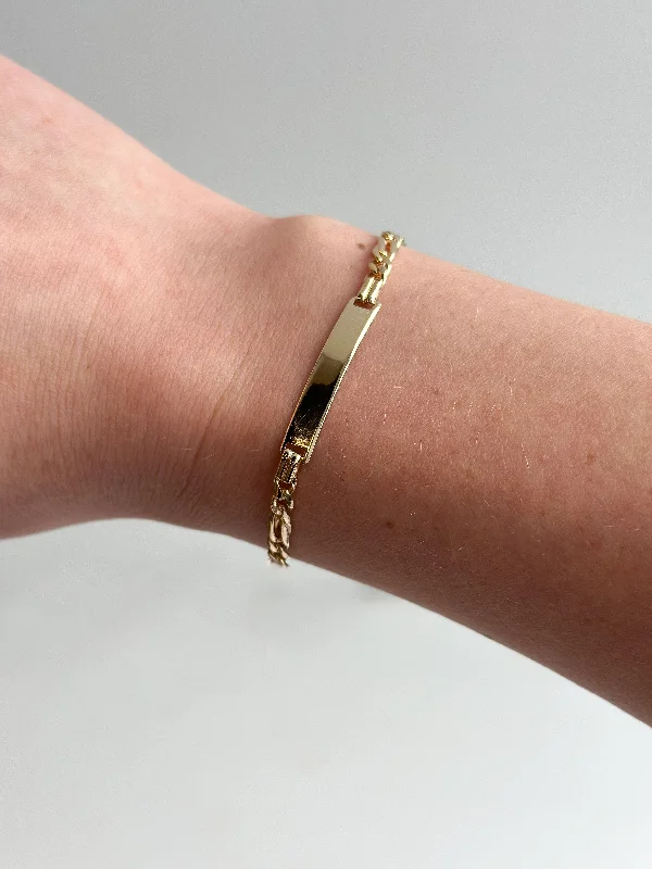 Solid Gold Bangles with Intricate EngravingsVintage 9ct Yellow Gold ID Bracelet With Figaro Link