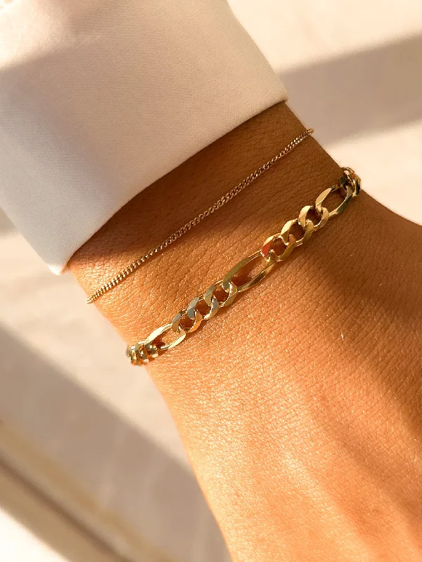 Solid Gold Bangles with Intricate EngravingsVintage 9ct Yellow Gold Figaro Link Bracelet