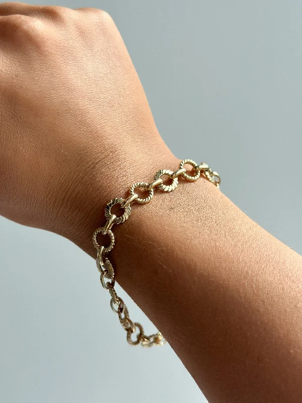 Solid Gold Bangles with Intricate EngravingsVintage 9ct Yellow Gold Oval And Round Twisted Link Bracelet